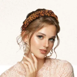 Unique Bargains Women's Leopard Pattern Knotted Headband Orange