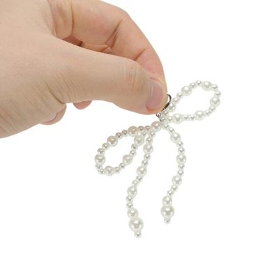 Unique Bargains Faux Pearl Bow Style 9 Shoelace Charms White 1 Pair 2 Unique Bargains Faux Pearl Bow Style 9 Shoelace Charms White 1 Pair - Image 2
